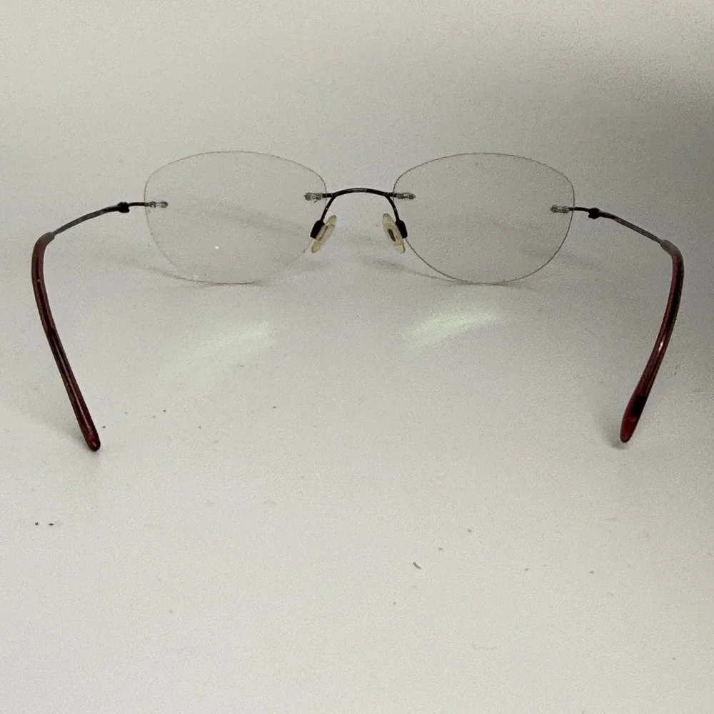 Charmant CH8600E WI Rimless Beta Titanium Eyeglasses Frames‎ 99-19-140 Burgundy